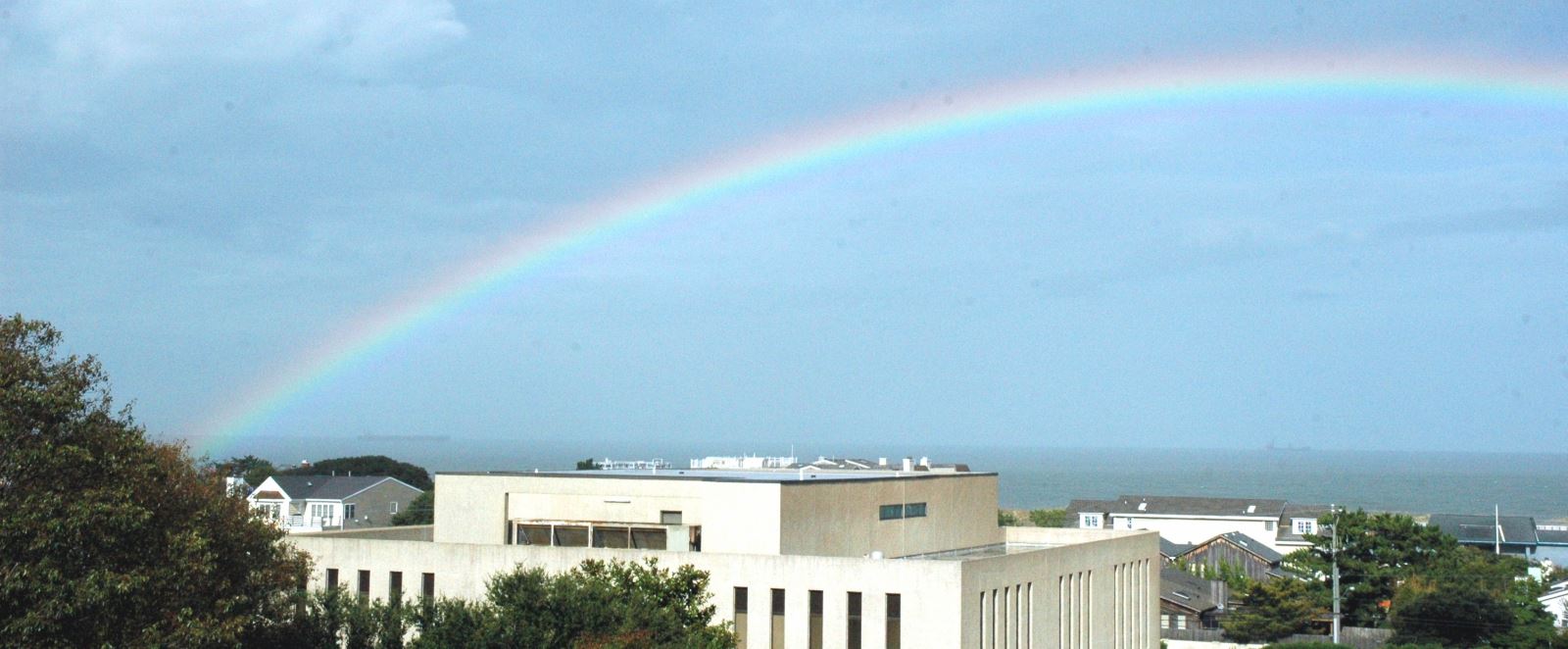 visitor center with rainbow